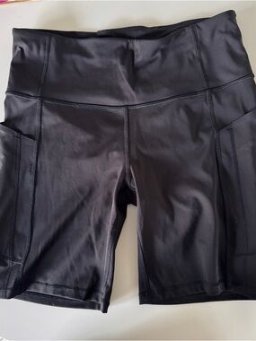 Athleta Ultimate Stash Black High-Rise Bike Shorts with Side Pockets
